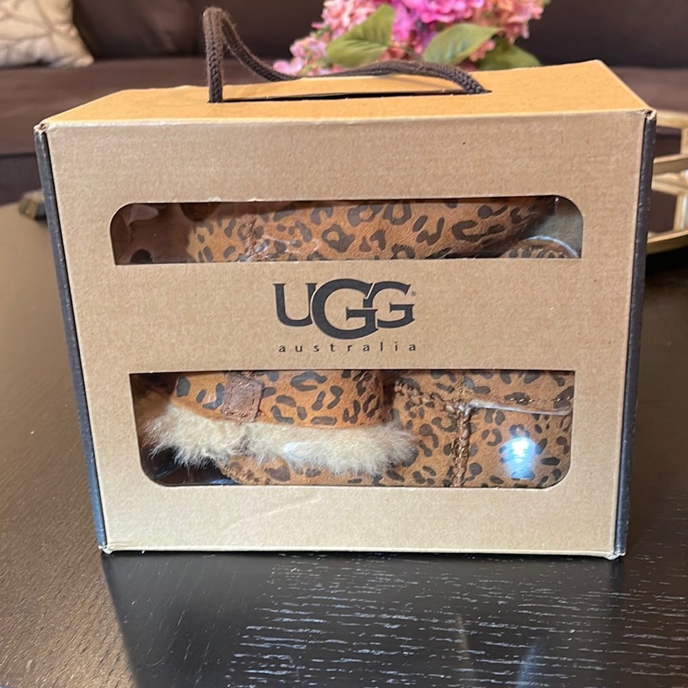 Lightly worn UGG Australia baby boots 6 months to 1 year.